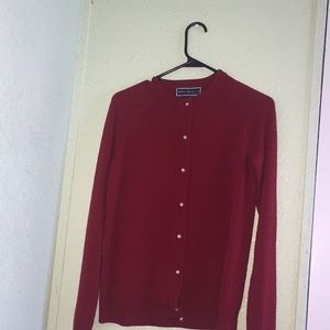 red sweater/cardigan